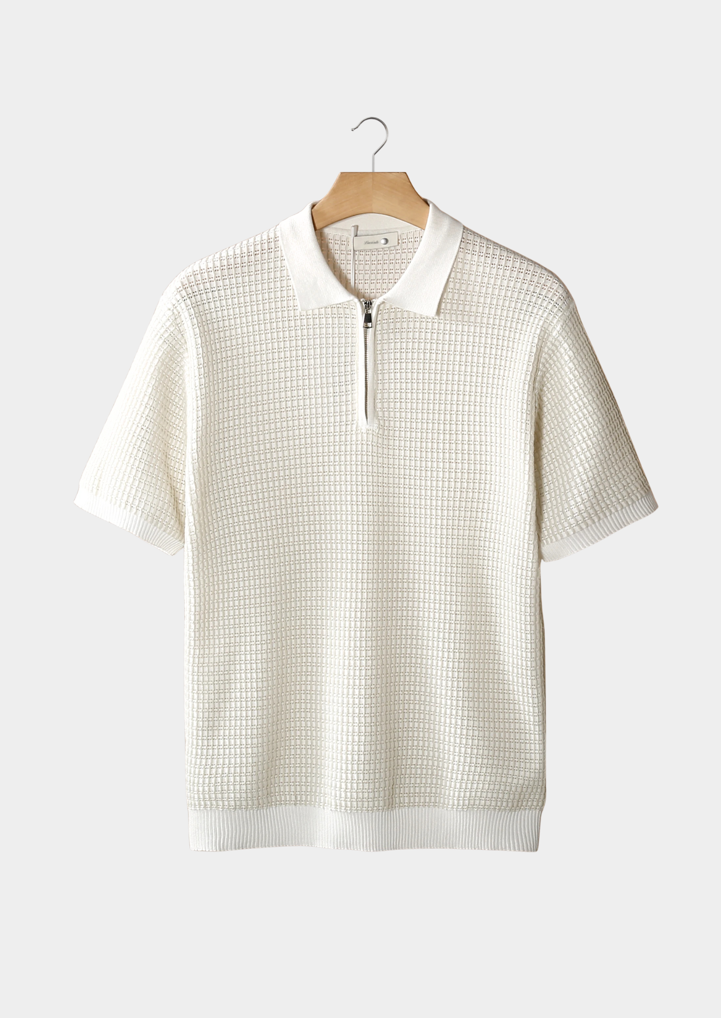 POLOSHIRT MIT GEOMETRISCHEM STRUKTURMUSTER UND REISSVERSCHLUSS